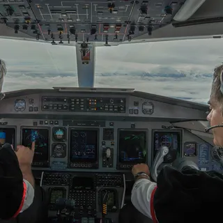 Pilots in an airliner cockpit