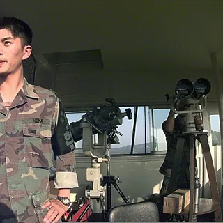 A South Korean soldier watches the North from a post in the Demilitarized Zone.