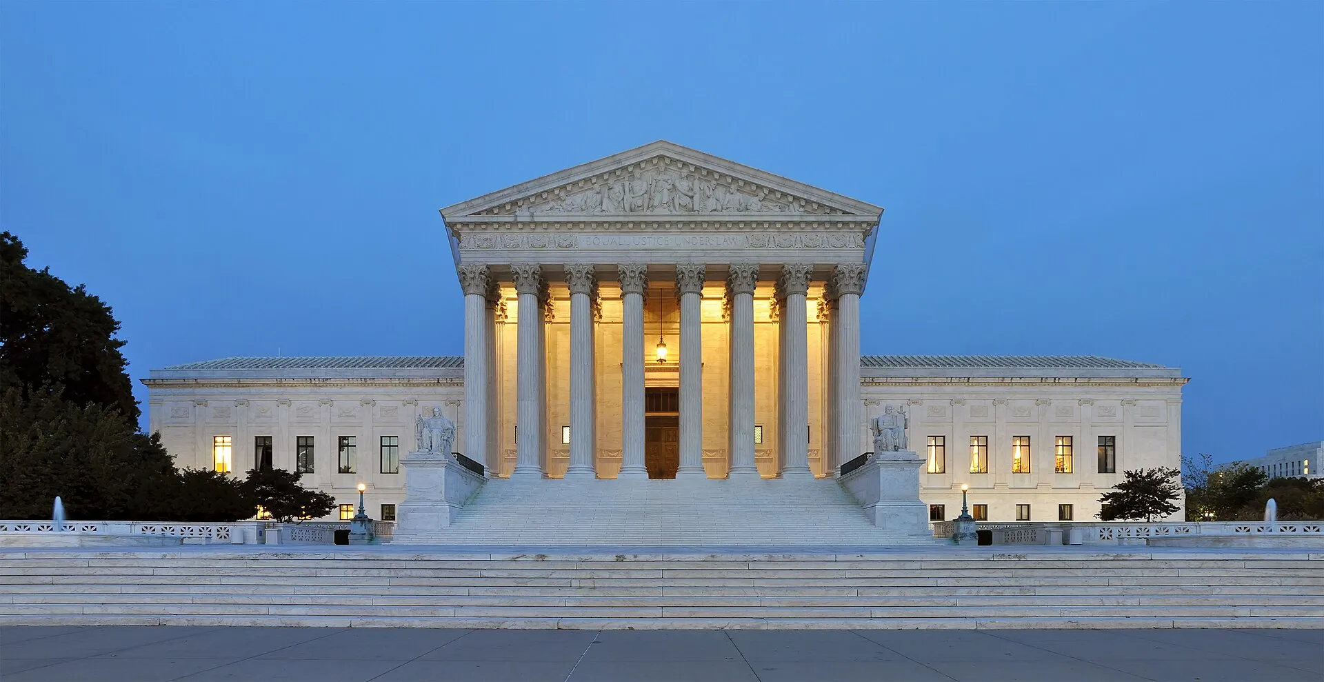 The US Supreme Court building in Washington at dusk